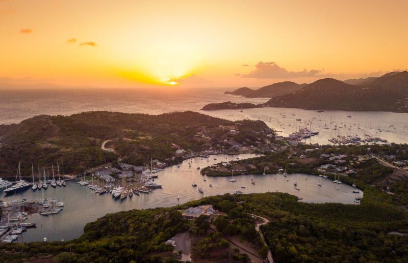 A spectacular sunset over English and Falmouth Harbours in Antigua photo copyright RORC / Arthur Daniel taken at Royal Ocean Racing Club