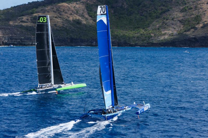 Battle of the MOD70s: Lloyd Thornburg's Phaedo3 and Tony Lawson's Concise 10 at the start of the RORC Caribbean 600 photo copyright RORC / Tim Wright taken at Antigua Yacht Club and featuring the MOD70 class