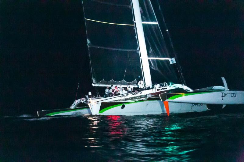 Arriving under the cover of darkness, Lloyd Thornburg's MOD70, Phaedo3 crosses the finish line of the RORC Transatlantic Race in Grenada to take Multihull Line Honours photo copyright RORC / Arthur Danie taken at  and featuring the MOD70 class