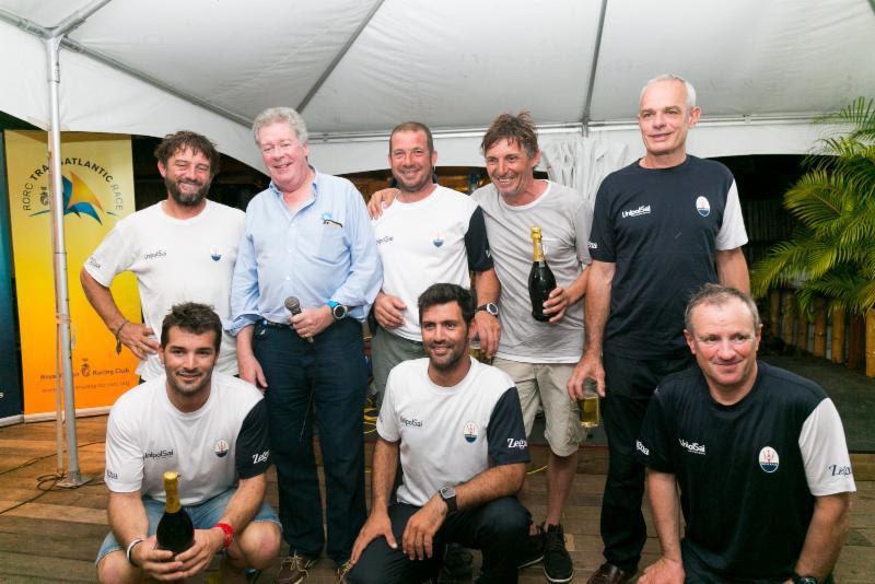 RORC Admiral, Andrew McIrvine, Giovanni Soldini and the crew of MOD70 Maserati at Port Louis Marina's Victory Bar for the Multihull prizegiving in the RORC Transatlantic Race photo copyright RORC / Arthur Danie taken at  and featuring the MOD70 class