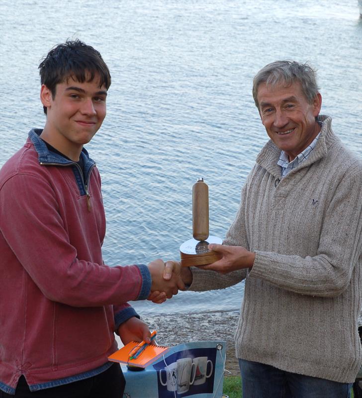 16 year old CJ Vice receives the Junior Trophy after the 2015 Bottle Boat Championship at Waldringfield photo copyright Roger Stollery taken at Waldringfield Sailing Club and featuring the Model Yachting class
