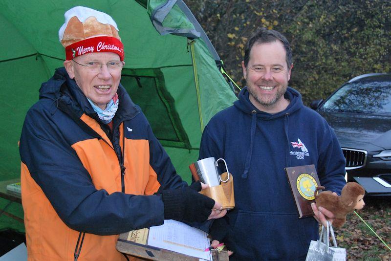 Roger Stollery (L) presents Brass Monkey and GAMES trophies to the winner, Rob Vice, in the Marblehead Brass Monkey and GAMES 11 event at Abbey Meads Lake photo copyright GMYC taken at Guildford Model Yacht Club and featuring the Model Yachting class