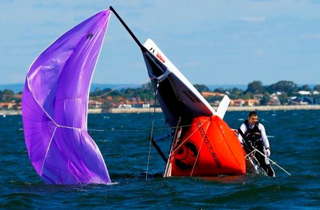 James Lewis salute on day 1 of the Musto Skiff 2015 Australian Nationals photo copyright Steve Schneider taken at Mounts Bay Sailing Club, Australia and featuring the Musto Skiff class