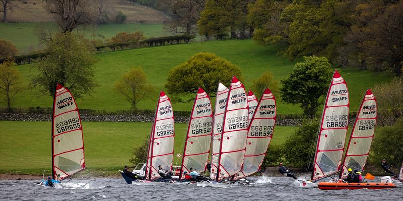 Musto Skiffs in action at the Ullswater Yacht Club Daffodil Regatta photo copyright Tim Olin / www.olinphoto.co.uk taken at Ullswater Yacht Club and featuring the Musto Skiff class