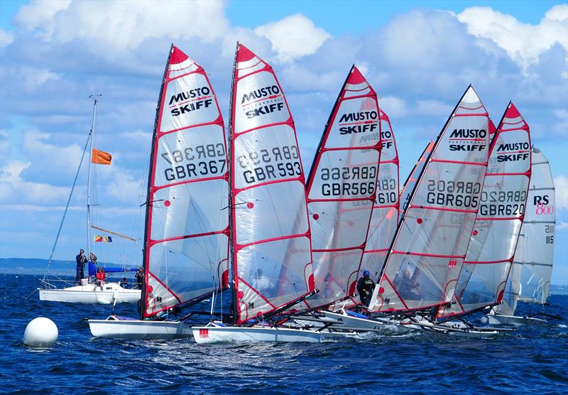 Musto Skiffs bunch on the line during the East Lothian Yacht Club 2021 Regatta photo copyright Derek Braid taken at East Lothian Yacht Club and featuring the Musto Skiff class