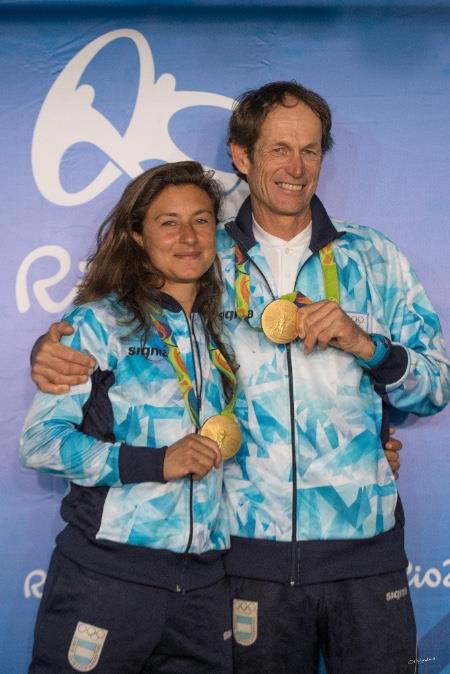 Santi Lange and his crew Cecilia Carranza Saroli with their gold medals in Rio 2016 photo copyright Pocho Capizzano taken at  and featuring the Nacra 17 class