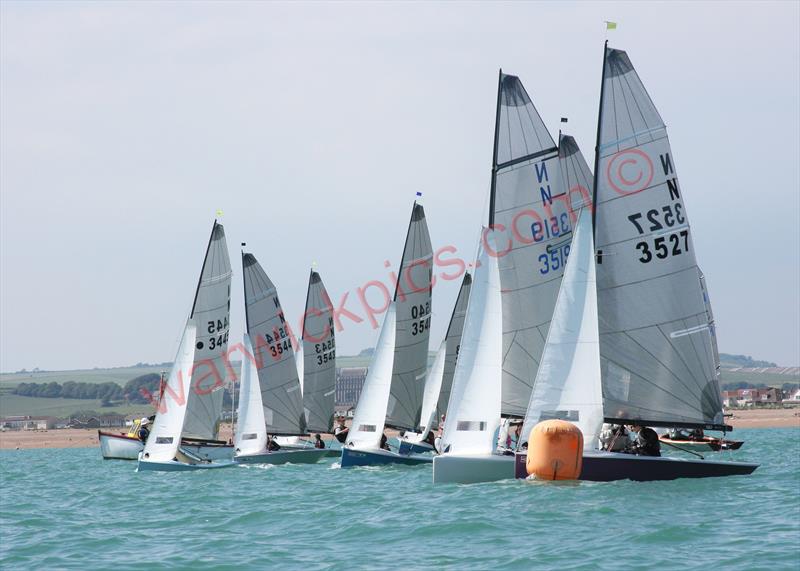 Race 2 start during the Shoreham National 12 open photo copyright Warwick Baker / www.warwickpics.com taken at Shoreham Sailing Club and featuring the National 12 class