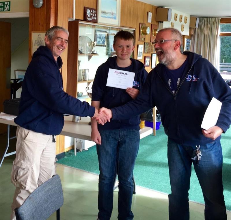 Angys Beyts and Stevie Gaston receive the Merit Award from SYC Commodore Jim Holland in the Gul National 12 Series Scottish Championship photo copyright Ed Willett taken at Solway Yacht Club and featuring the National 12 class