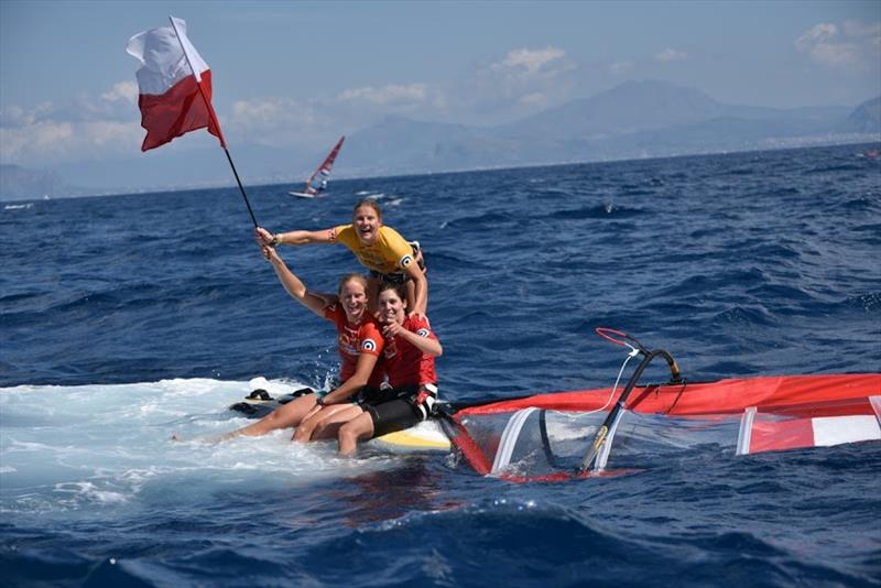 Polish celebrations at the RS:X European and Youth Championships photo copyright Salvatore Lopez - Albaria taken at  and featuring the RS:X class