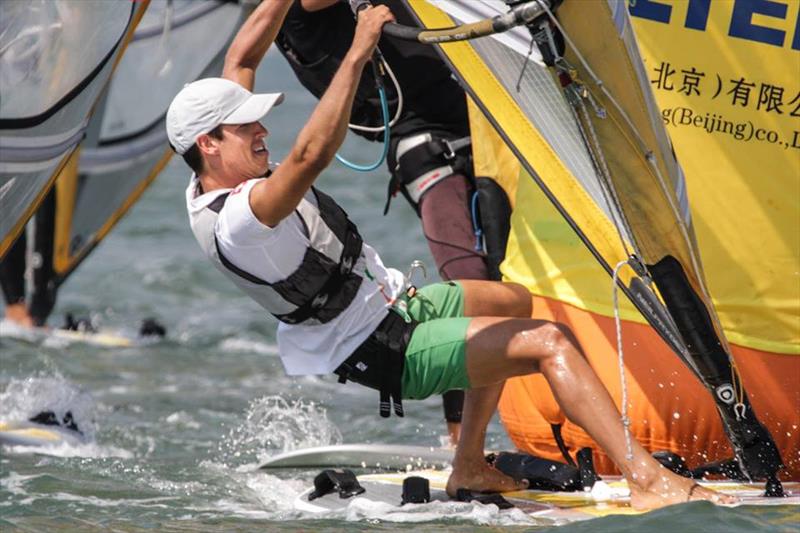 Mateo Sanz on day 2 of ISAF Sailing World Cup Qingdao photo copyright Daniel Smith taken at  and featuring the RS:X class