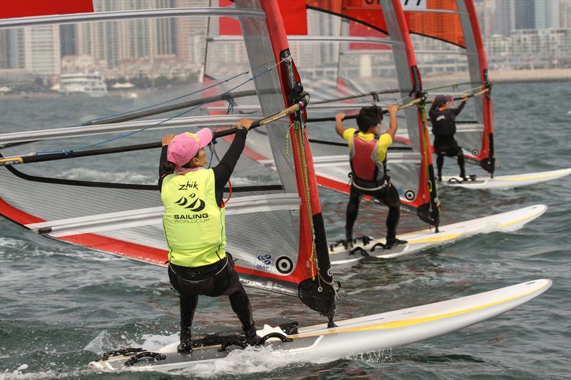 Women's RS:X fleet on Sailing World Cup Qingdao day 4 photo copyright Daniel Smith taken at  and featuring the RS:X class