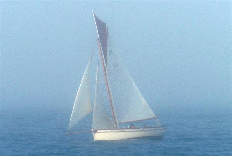 Charity in the fog during the Jackson Yacht Services Bay Race Series photo copyright Bill Harris taken at Royal Channel Islands Yacht Club and featuring the Gaffers class