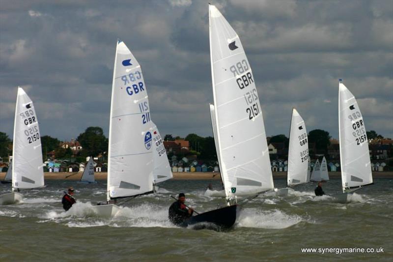 Charlie Cumbley in 211 during the International OK Dinghy UK Nationals at Dabchicks photo copyright Simon Cox / www.synergymarine.co.uk taken at Dabchicks Sailing Club and featuring the OK class