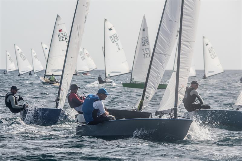 Racing on day 4 of the 2017 OK Dinghy Worlds photo copyright Alastair Deaves taken at Barbados Yacht Club and featuring the OK class
