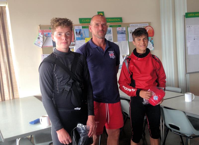 Class Vice Chairman, Dave Bourne (the tall one) with Junior winners Hugo Burrows (left) and Joe Scarborough (right) after the OK Dinghy Inland Championship at Rutland photo copyright Rodney Tidd taken at Rutland Sailing Club and featuring the OK class