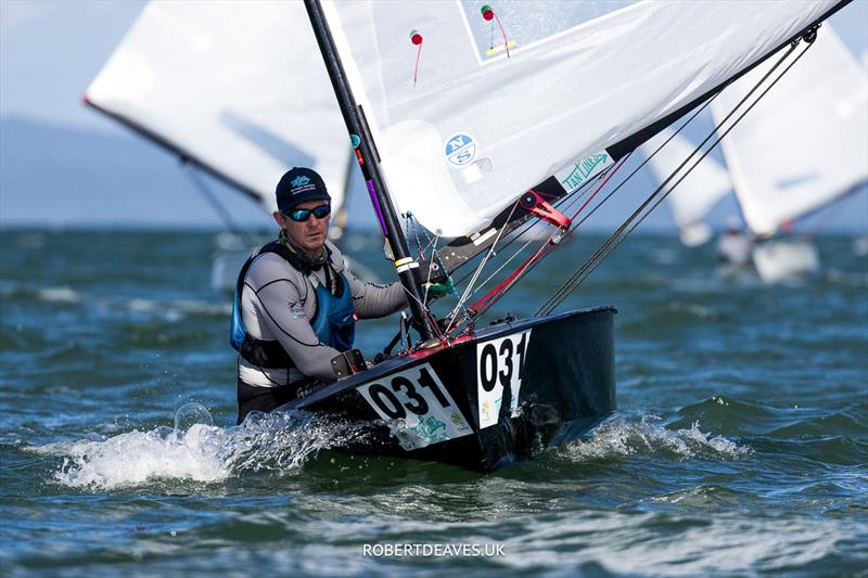 Sean Cleary, NZL on day 3 of the 2024 OK Dinghy World Championship Brisbane photo copyright Robert Deaves / www.robertdeaves.uk taken at Royal Queensland Yacht Squadron and featuring the OK class