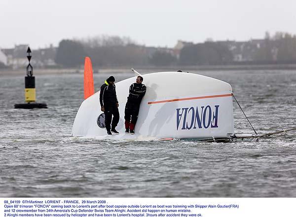 “FONCIA” was training in 20 knots of wind when she capsized photo copyright Thierry Martinez / www.thmartinez.com taken at  and featuring the IMOCA class