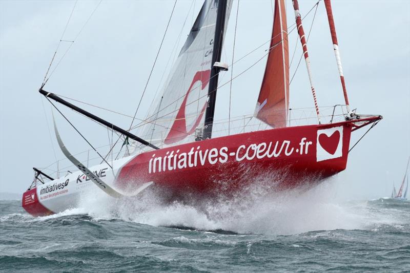 Sam Davies' IMOCA Initiatives Coeurs blasts her way out of the Solent in the Rolex Fastnet Race - photo © Rick Tomlinson / www.rick-tomlinson.com
