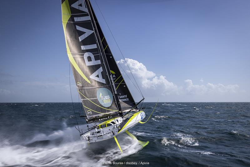 Charlie Dalin on APIVIA during the Route du Rhum - Destination Guadeloupe photo copyright Pierre Bouras / Disobey. / Apivia taken at  and featuring the IMOCA class