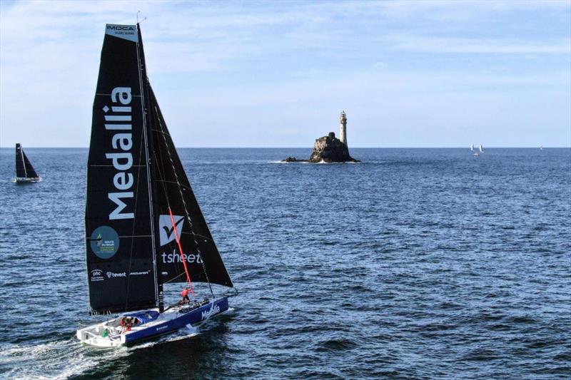 2023 Rolex Fastnet Race - Medallia approaches the Fastnet Rock in more sedate conditions photo copyright Medallia / James Tomlinson taken at Royal Ocean Racing Club and featuring the IMOCA class