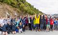 Competitors with the America's Cup at the Toyota New Zealand Optimist National Championships. Queen Charlotte Yacht Club. April 2024 © Suellen Hurling