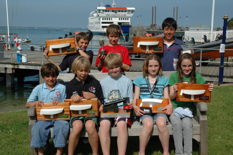 Prizewinners from the Optimist Southerns at Fishbourne (top left to right; Joseph Burns, Scott Wallis, Tarra Gill-Taylor. Bottom left to right; Hugo Andrews, Chris Taylor, Craig Dibb, Nicole Deacon Smith, Zoe Parkinson) photo copyright Paul Billington / Patersons Photography taken at  and featuring the Optimist class