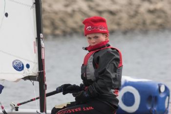 Ella Stoggall finishes as first junior during the Derbyshire Youth Sailing event at Toddbrook