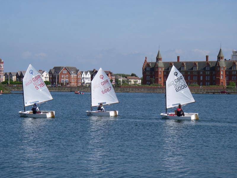 Drew Gibbons leading the Optimist fleet during the Lloyd Hayes Trophy photo copyright Martin Butcher taken at West Lancashire Yacht Club and featuring the Optimist class
