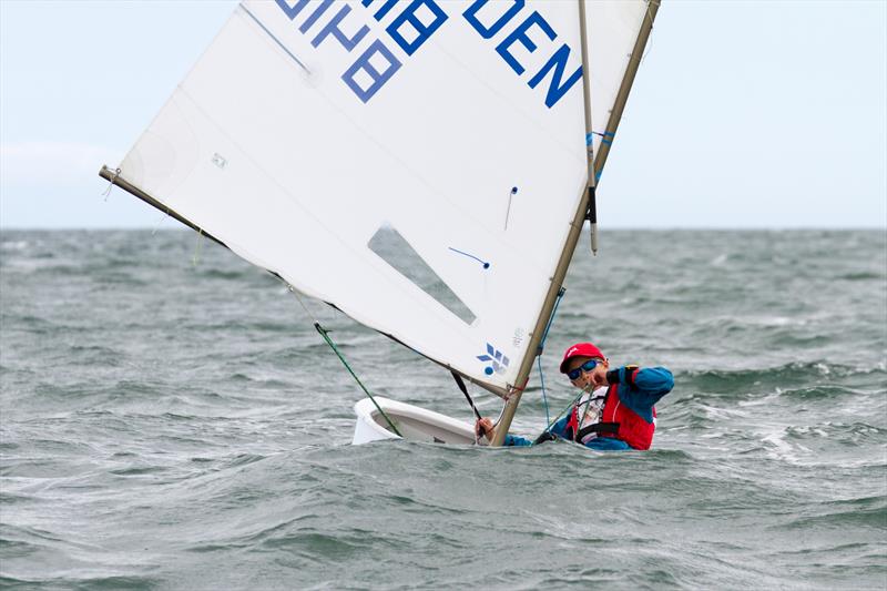 Valdemar Krake Frandsen (DEN 8418)competing in the second day of the Optimist European Championships on Dublin Bay photo copyright Gareth Craig / www.fotosail.com taken at Royal St George Yacht Club and featuring the Optimist class