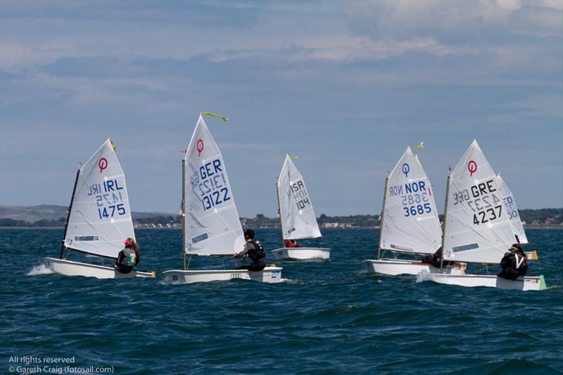 Local sailor Clare Gorman (IRL 1475) competing in the third day of the Optimist European Championships on Dublin Bay - photo © Gareth Craig / www.fotosail.com