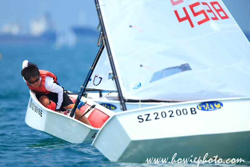 Fish & Co. Singapore Youth Sailing Championships day 3 photo copyright Howie Choo / www.howiephoto.com taken at Singapore Sailing Federation and featuring the Optimist class