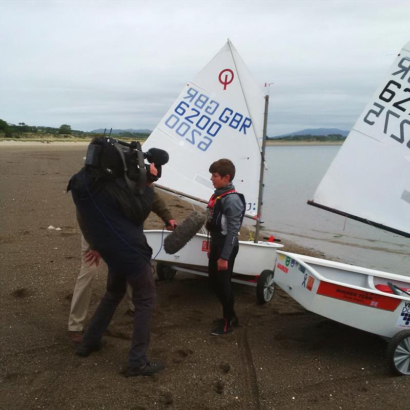 Rhys Lewis is interviewed for BBC Wales photo copyright Karenza Morton taken at Pwllheli Sailing Club and featuring the Optimist class