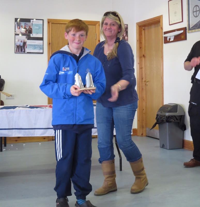 Scott Forbes finishes as 1st junior in the Optimist Scottish Championship at Helensburgh SC photo copyright Dougie Bell taken at Helensburgh Sailing Club and featuring the Optimist class