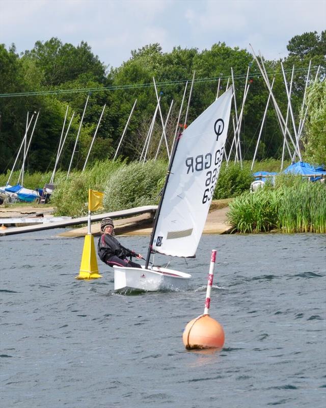 Finley Hartshorn crossing the finish line in race 9 to win the Optimist SW Championships at Frampton-on-Severn photo copyright Ken Elsey taken at Frampton on Severn Sailing Club and featuring the Optimist class