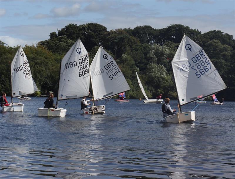 North West Junior Travellers at Redesmere photo copyright David Wallwork taken at Redesmere Sailing Club and featuring the Optimist class