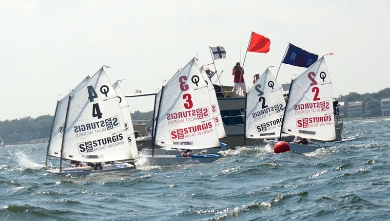 Team Racing is a highlight of all the Optimist Nationals. Two teams of four boats each go head to head photo copyright Talbot Wilson taken at Pensacola Yacht Club and featuring the Optimist class