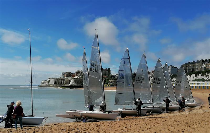 Phantoms lined up on the beach at Broadstairs photo copyright Anna Cook taken at Broadstairs Sailing Club and featuring the Phantom class