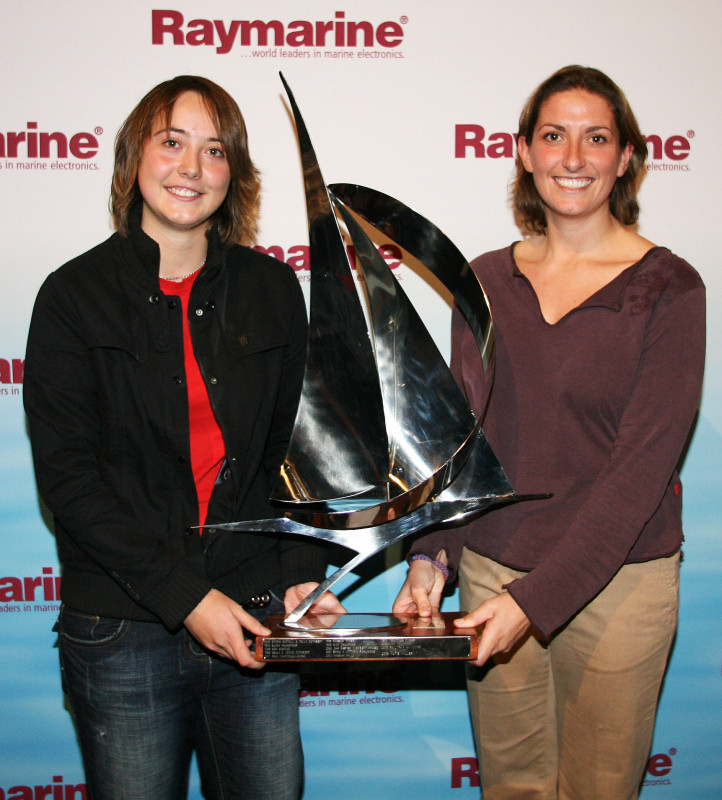 Katie Miller is presented with the prestigious title of Raymarine Young Sailor of the Year award by Dee Caffari photo copyright OnEdition taken at  and featuring the  class