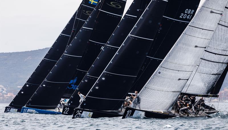 Heading for the start line on day 1 of the RC44 Sotogrande Cup photo copyright www.MartinezStudio.es taken at  and featuring the RC44 class