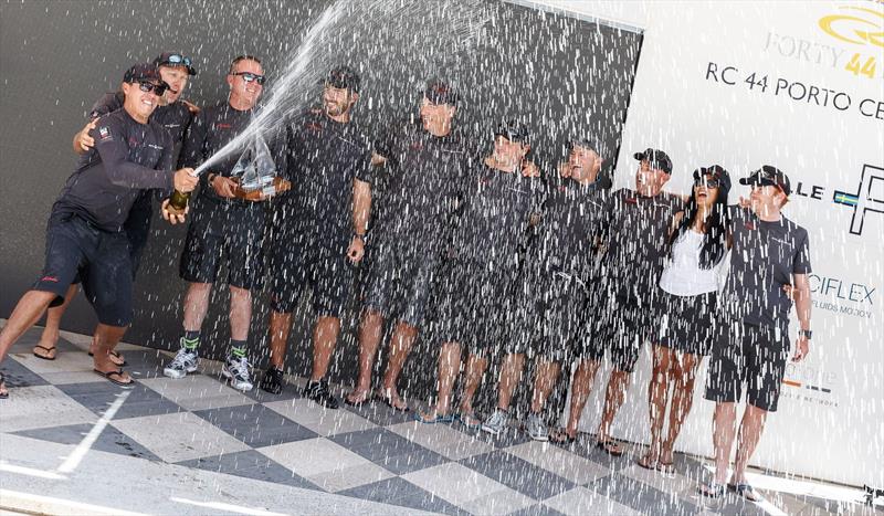 Katusha gets their first event champagne moment on day 4 of the RC44 Porto Cervo Cup photo copyright Nico Martinez / www.MartinezStudio.es taken at Yacht Club Costa Smeralda and featuring the RC44 class