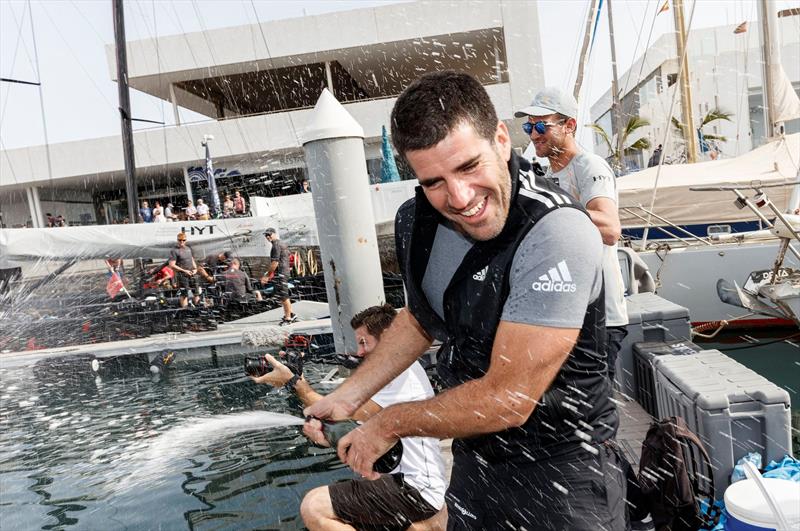 Double celebration on the dock for Peninsula Petroleum's owner John Bassadone on day 2 of the RC44 Calero Marinas Cup photo copyright Martinez Studio / RC44 Class taken at  and featuring the RC44 class