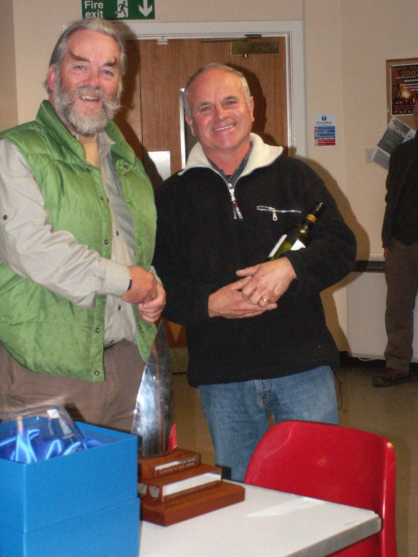 Chris Treagust receives the winners trophy from race officer Farquhar Mat photo copyright RC Laser Class Association taken at Burghfield Sailing Club and featuring the RC Laser class