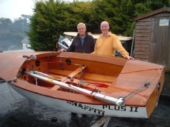 Phil Morrison and Ian Teasdale with Steve and Jack Cockerill's National Championship Winning Boat - with their thinking caps on