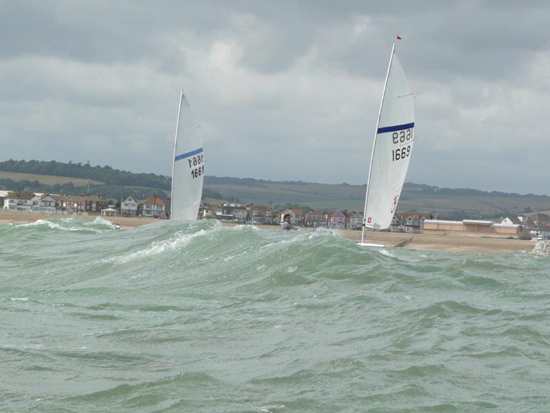 The battle for second overall; Ian Jones in 1669 and Alan Gillard 1661 (somewhere under that wave!) during the Streaker nationals at Lancing photo copyright Isabelle Jackson taken at Lancing Sailing Club and featuring the  class
