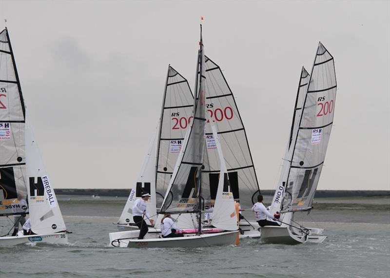 Near misses rounding the top mark at the Endeavour Trophy 2016 photo copyright Roger Mant taken at Royal Corinthian Yacht Club, Burnham and featuring the RS200 class