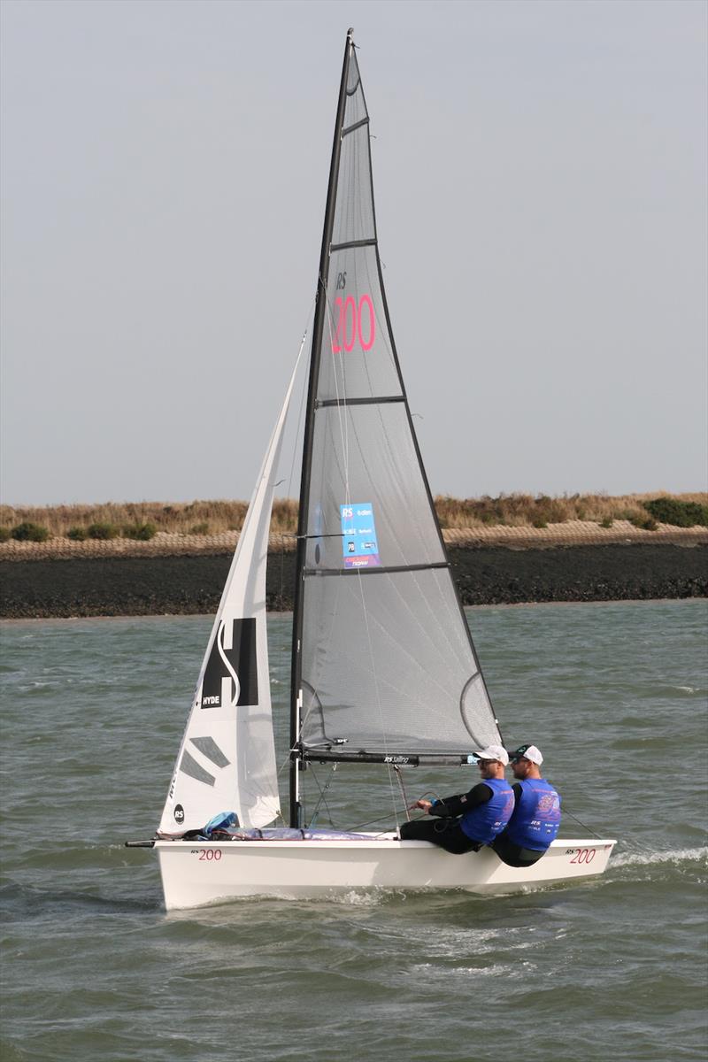 Endeavour 2023 Day 1: Christian Birrell and Luke Patience (Merlin Rocket) take a comfortable lead in race three photo copyright Sue Pelling taken at Royal Corinthian Yacht Club, Burnham and featuring the RS200 class