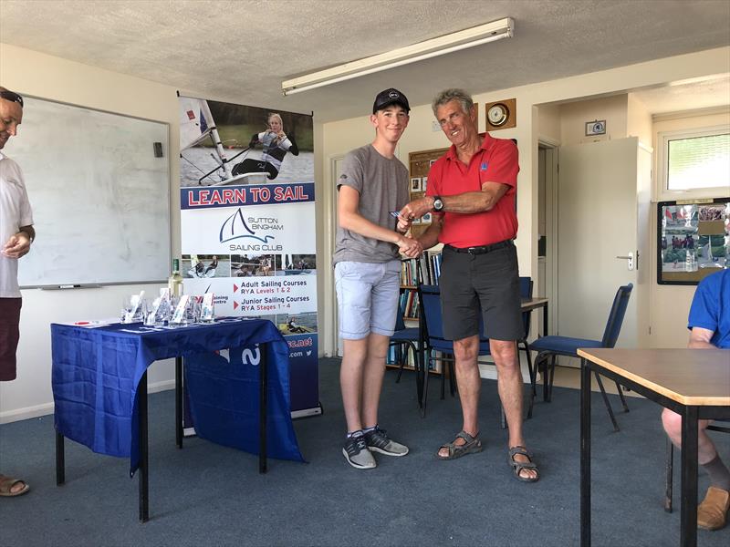 Andrew Frost receiving trophy and CoastWatersports vouchers in the CoastWatersports Sutton Bingham RS Aero Open photo copyright Kelsey Green taken at Sutton Bingham Sailing Club and featuring the  class