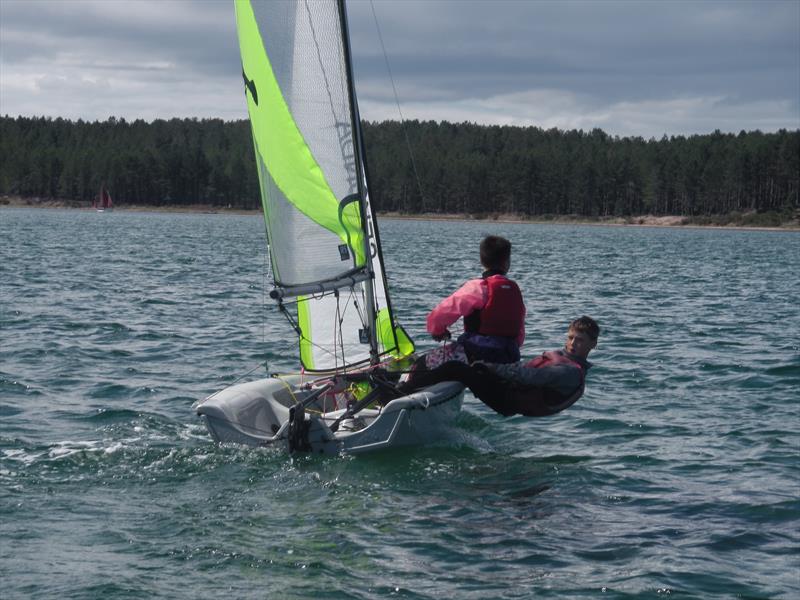 Scottish RS Feva Championship winners Ewan and Harry working their way upwind photo copyright Matt Toynbee taken at Royal Findhorn Yacht Club and featuring the RS Feva class