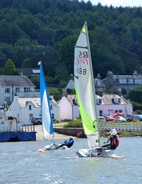 Two of the White Caps, the Improvers group heading out of Kippford at Solway Yacht Club Cadet Week photo copyright Ian Purkis taken at Solway Yacht Club and featuring the RS Feva class