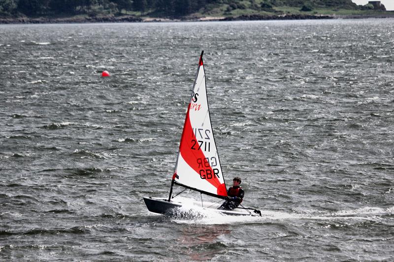 Ewan Wilson blasting on a reach in 30 knots at Dalgety Bay photo copyright Liz Tulloch taken at Dalgety Bay Sailing Club and featuring the RS Tera class